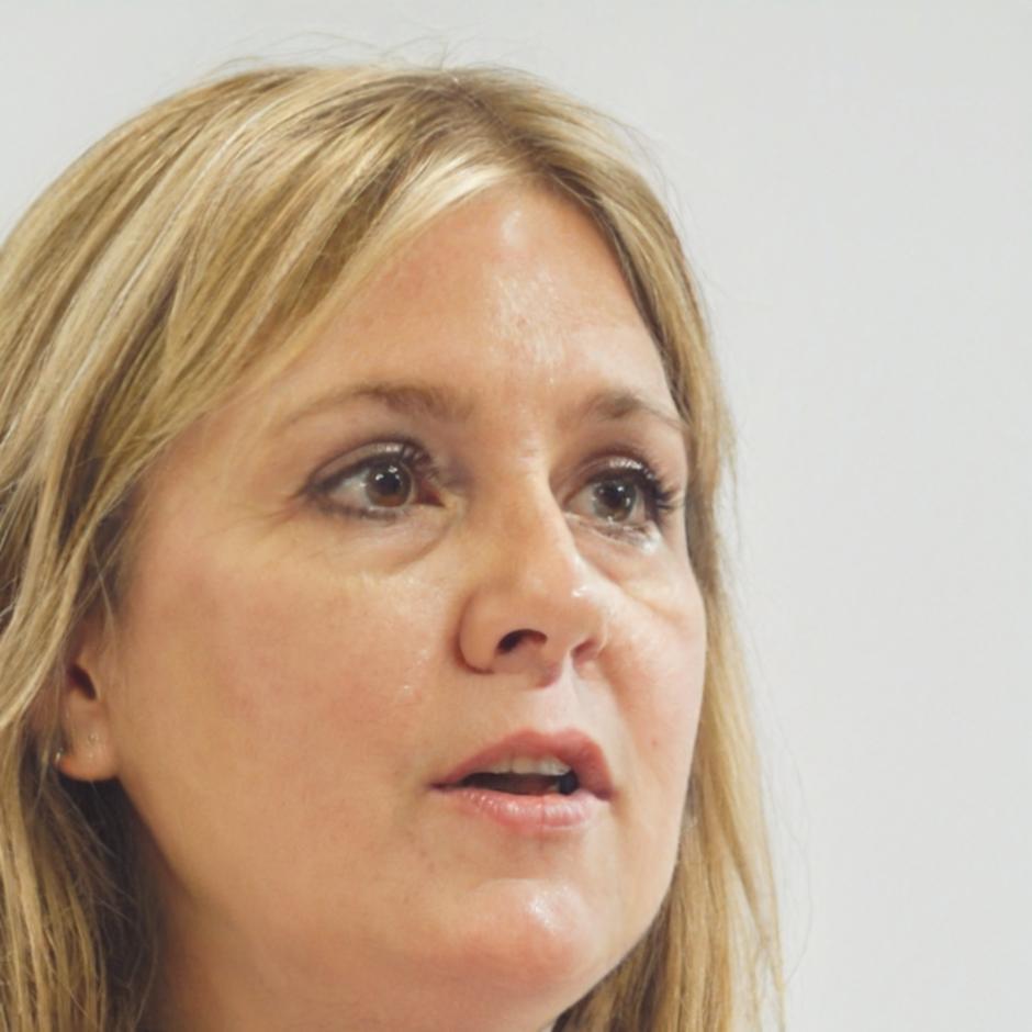 Bronwyn Caldwell standing in bright office space